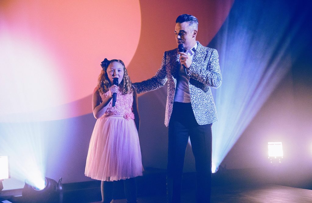 Robbie Williams gives fan a Priceless Surprise